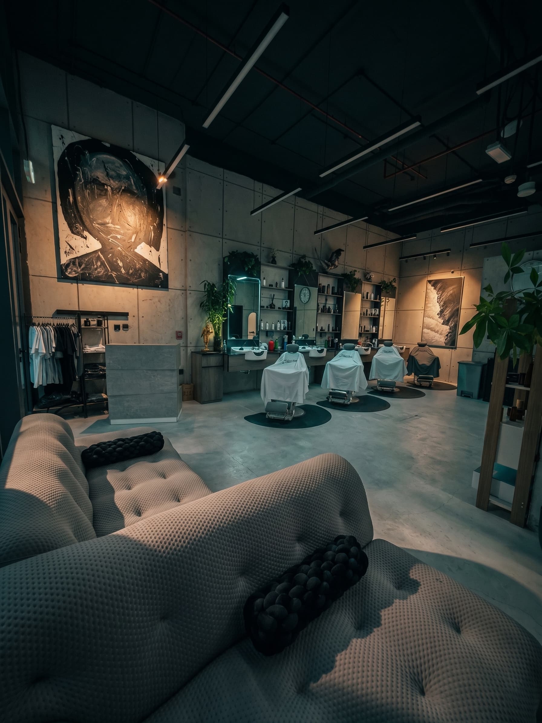 Success Barbershop interior — lounge and barber stations